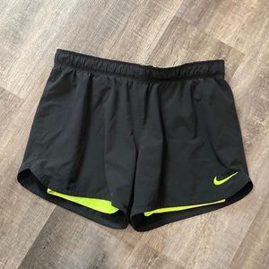 Nike black and bright green workout shorts size s